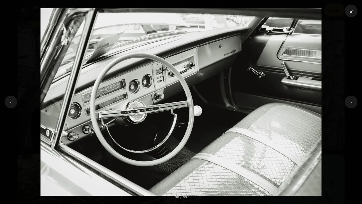 JW Cooper Photography: Black-and-white classic Dodge dashboard, steering wheel and front seat